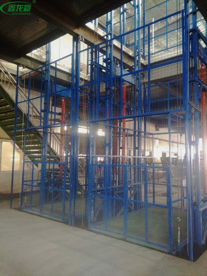 雙油缸導(dǎo)軌式升降機(jī) 雙油缸導(dǎo)軌式升降機(jī)